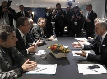 French Foreign Minister Fabius talks to United Nations Secretary General Ban and Executive Secretary of the UNFCCC Figueres during the COP21 at Le Bourget, near Paris, France, December 5, 2015. REUTERS/Stephane Mahe