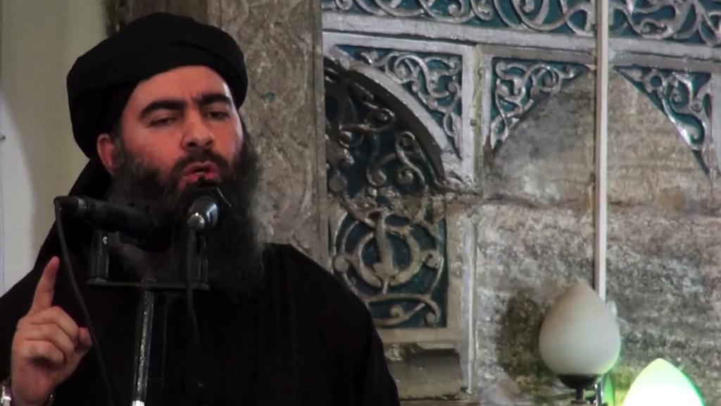 Abou Bakr al-Bagdhadi, lãnh đạo tổ chức khủng bố Nhà nước Hồi giáo, tại Mossoul, Irak, trong một băng video công bố ngày 05/07/ 2014. AFP PHOTO / HO / AL-FURQAN MEDIA 